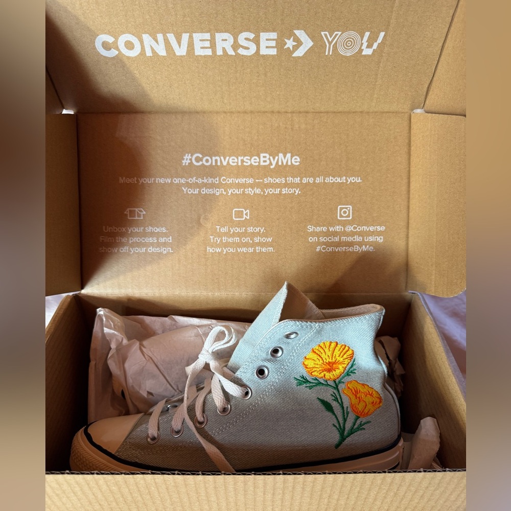 New in box!! Converse hi top custom light blue shoes with flowers.